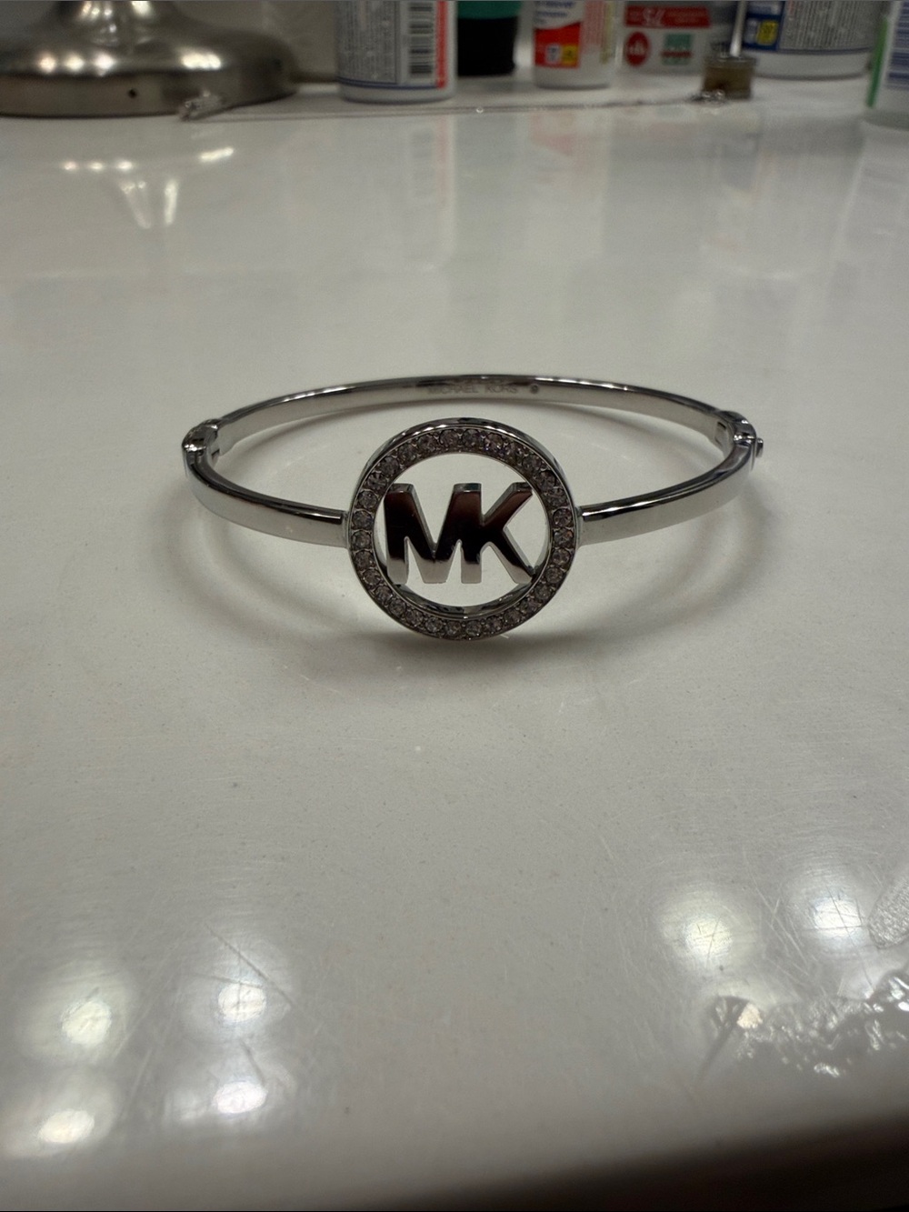 Michael Kors Silver Circle MK Logo Crystal Bangle Bracelet